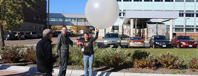 Students using weather balloon