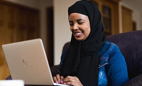 Student on laptop at home