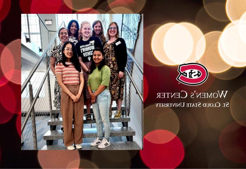 Small group of women standing on stairs